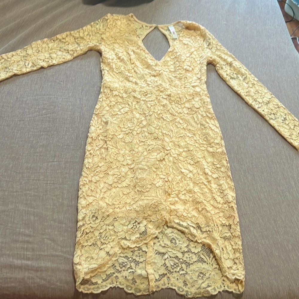 Long sleeve floral lace dress.